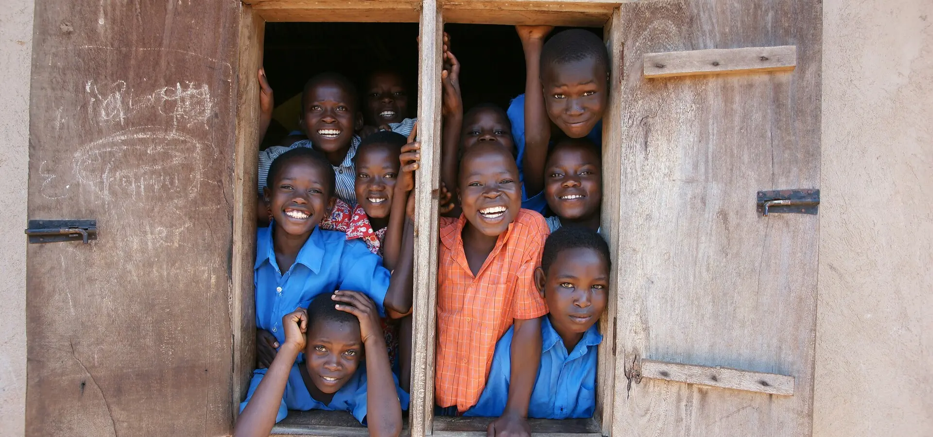 Avila Travel Uganda kids at schooljpg